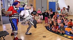 Lots of physical comedy involved when Cherie & Dave read a story